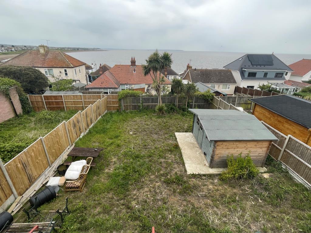 Lot: 124 - DETACHED FOUR-BEDROOM HOUSE WITH IMPRESSIVE SEA VIEWS - View of the garden from the balcony